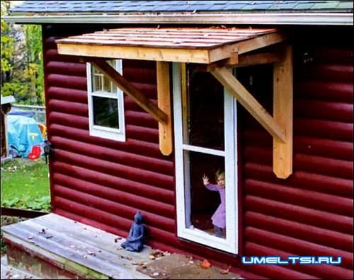 Козырек над входом в дом Козырек над входом в дом